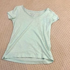 Women’s mint green V-neck shirt